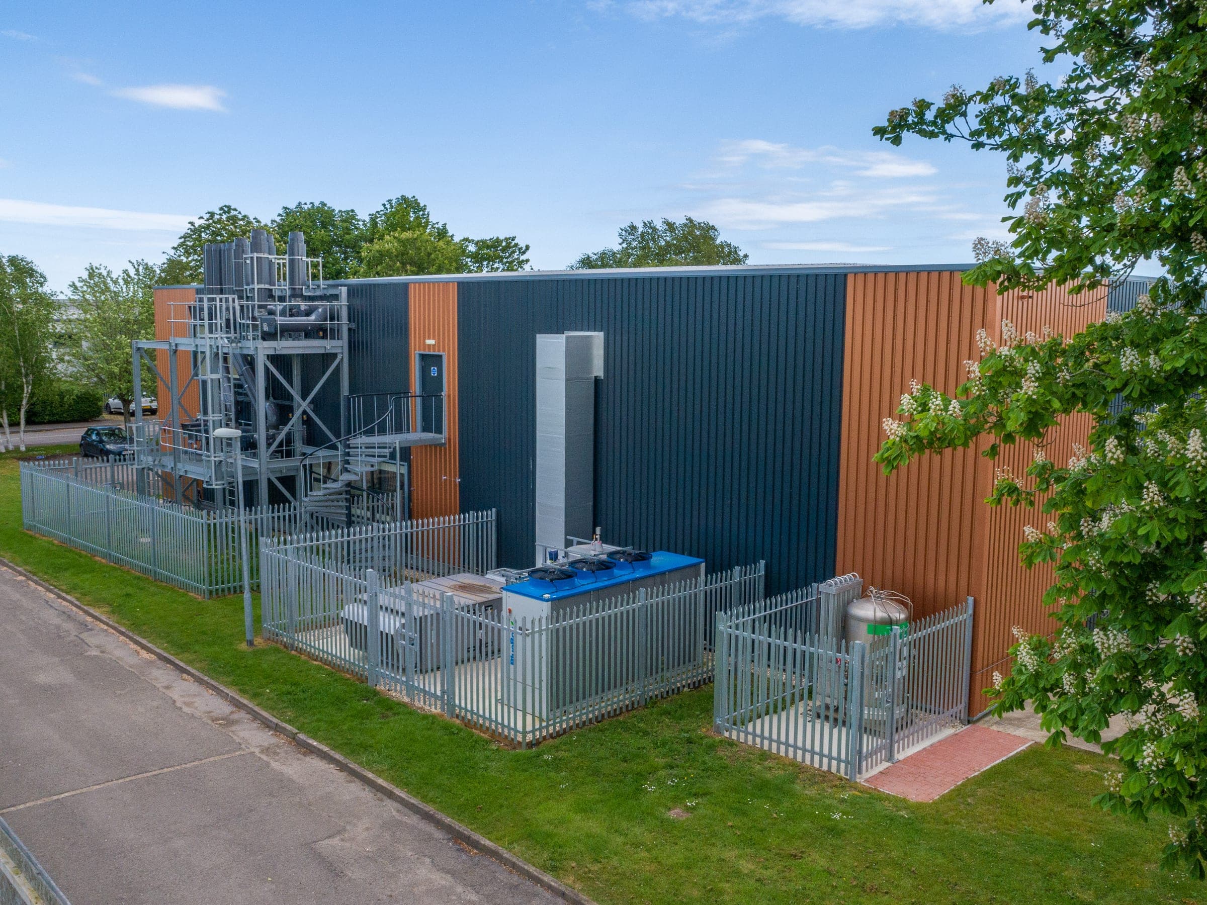 PhosphonicS facility exterior with air handling unit and argon tank visible outside the building